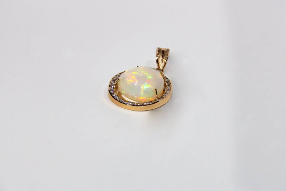 Pendiente en oro rosa 14k con 27.00 quilates de Ópalo Fino y 2.50 en diamantes - Image 2