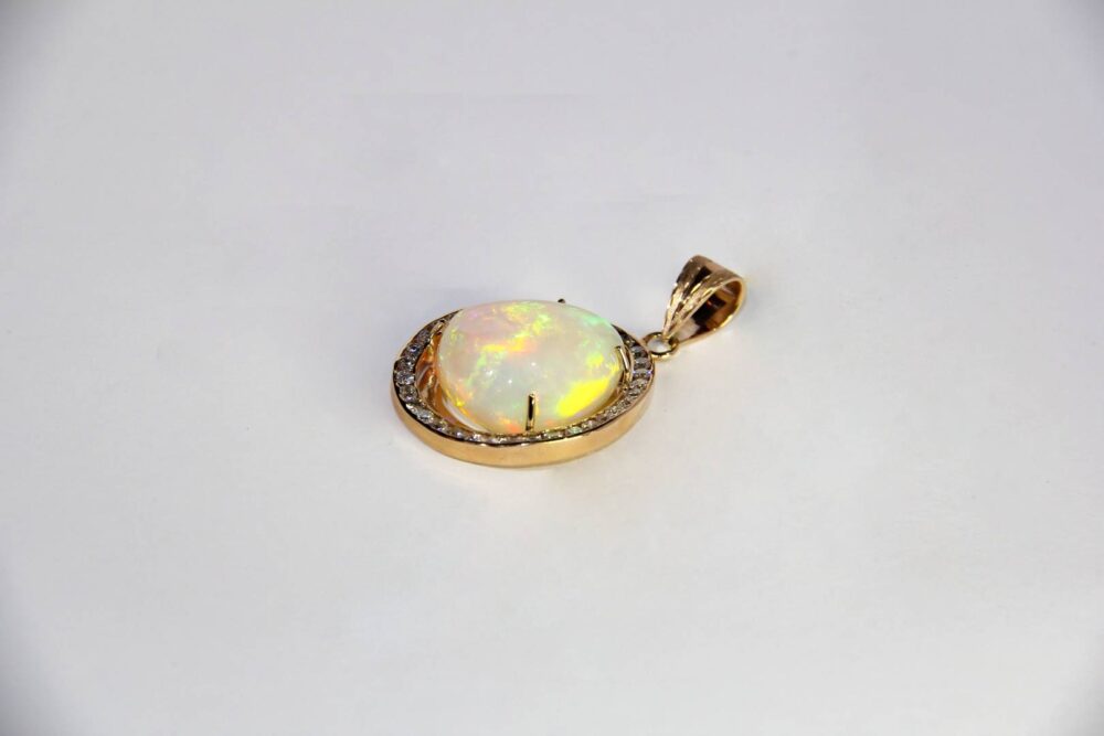 Pendiente en oro rosa 14k con 27.00 quilates de Ópalo Fino y 2.50 en diamantes - Image 3